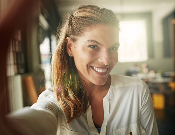 istock Taking a selfie in her favourite coffee shop 517084838