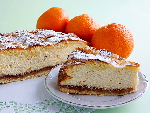 istock cheese cake with sweet rose jam and oranges 517086046