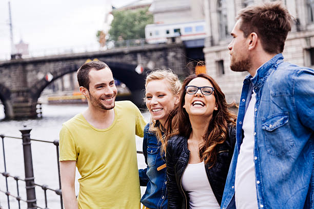 istock Two Young Couples Leisure Alley Walk 517086538