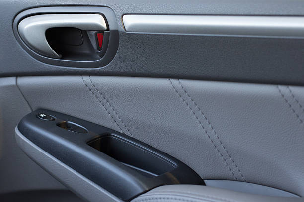 istock Vehicle Door Panel with Locks and Power Window Buttons Showing 517086824