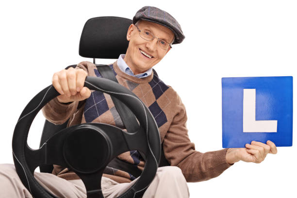 istock Cheerful senior driver holding an L-sign 517089158
