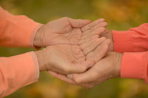 istock Couple of hands together 517089506