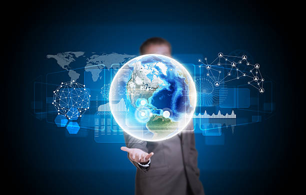 istock Businessman in suit hold Earth with graphs and network 517092645
