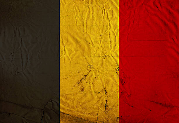 Colors of the Belgian flag with a grunge layer