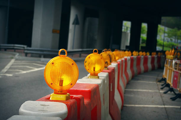 Construction light on the city road Construction light on the city road barricade photos stock pictures, royalty-free photos & images