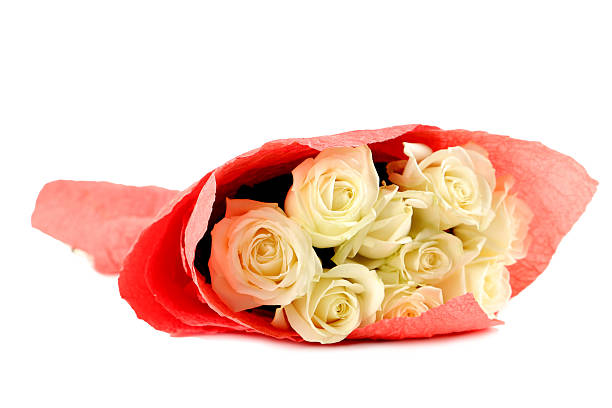 istock Bouquet of white roses isolated on white 517101686