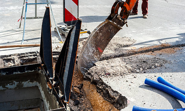 istock mini excavator equipped with a very narrow bucket 517102350