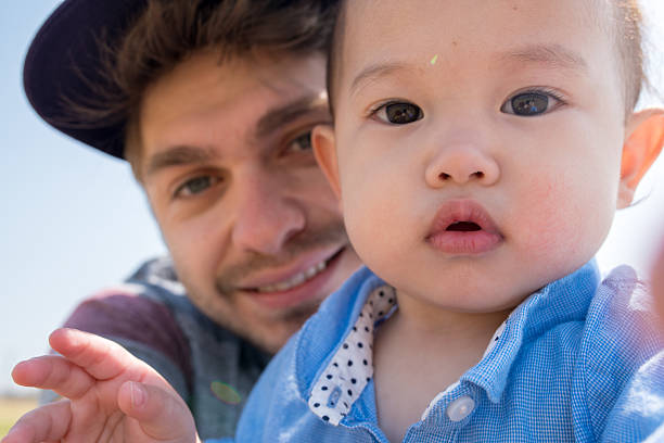 istock Father and daughter taking a selfie together 517102404