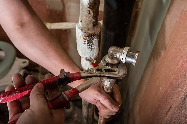 istock Replacing the faucet in the bathroom 517104634