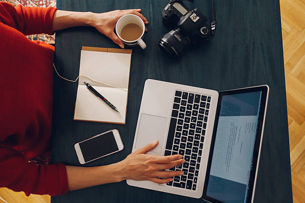 istock Overhead image of a workspace on the desk 517106102