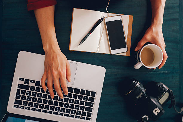 istock Overhead image of a workspace on the desk 517106456