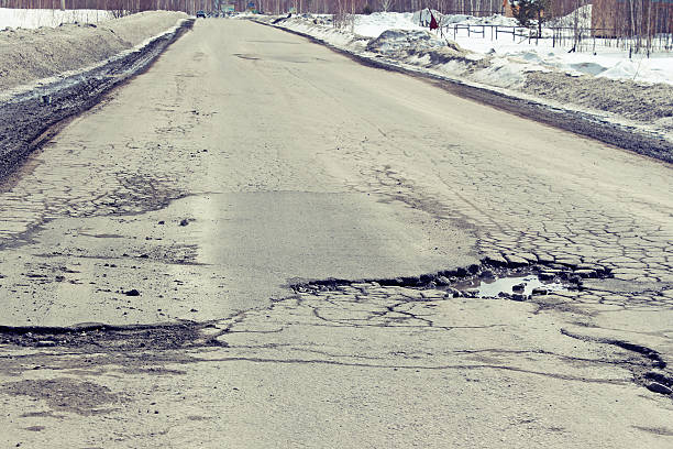 istock Large pit on the suburban road 517106464