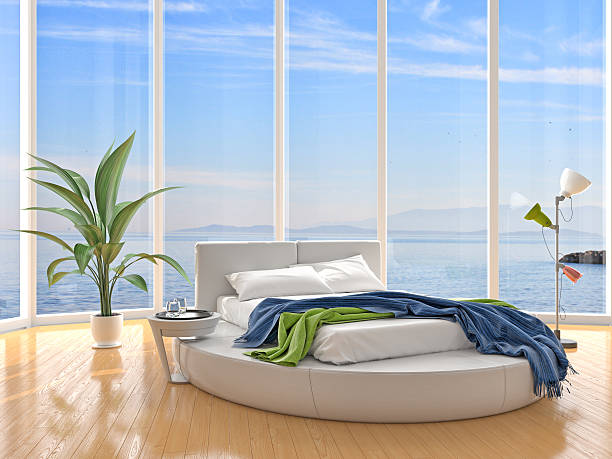 istock Luxury bedroom with windows on cloudscape the sea 517107776