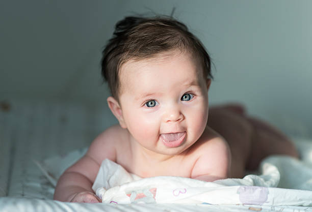 istock cute baby with dark hair 517109520