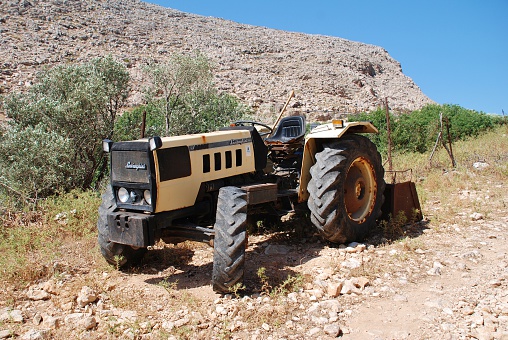 Halki, Greece - June 15, 2015: A Lamborghini tractor parked at Chorio on the Greek island of Halki. First manufactured in 1948 by Lamborghini Trattori, the brand is now owned by Italian based SDF Group.