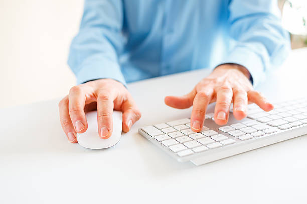 istock Men office worker typing on the keyboard 517111964