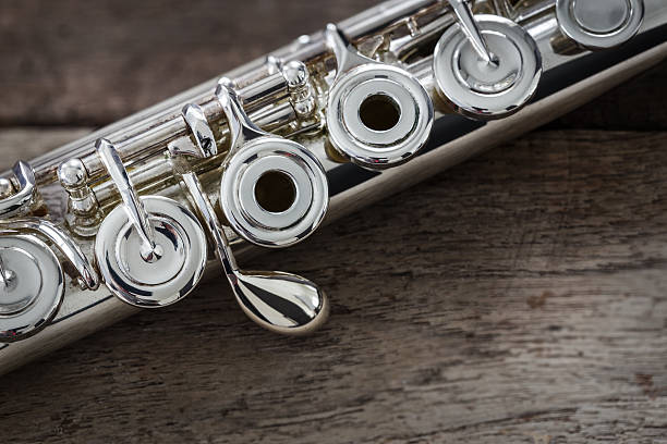 Detail of gold flutes on black background