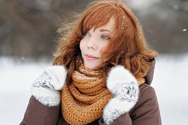 istock Young beautiful woman in winter 517117845