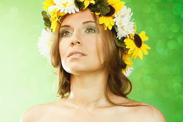 istock Beautiful woman with flower wreath 517121352