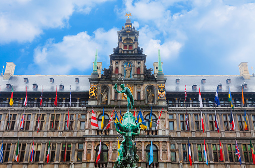 Antwerp's Town Hall and the flags of the countries of the European Union.