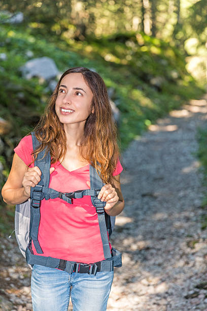 istock Woman hiking in the forest during summer 517124782