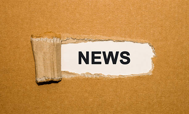 istock The text News appearing behind torn brown paper 517127342