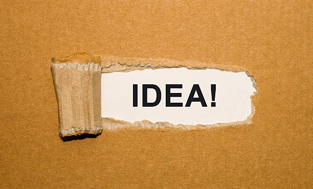 istock The text Idea appearing behind torn brown paper 517127468