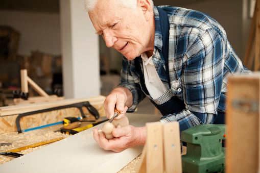 Senior carpenter in his workshop