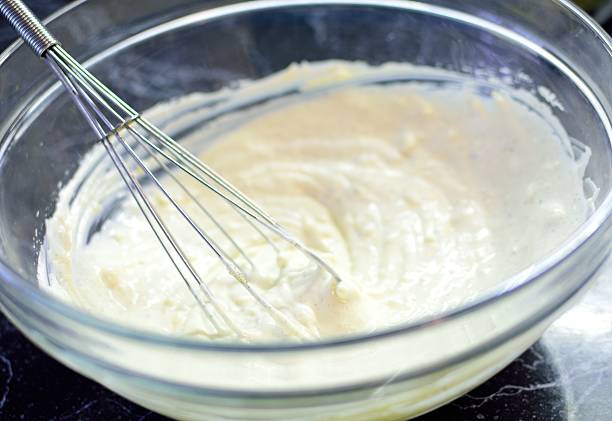 istock Cheese with whisk in bowl 517131422
