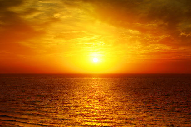 istock Beautiful sunset above the sea 517132036