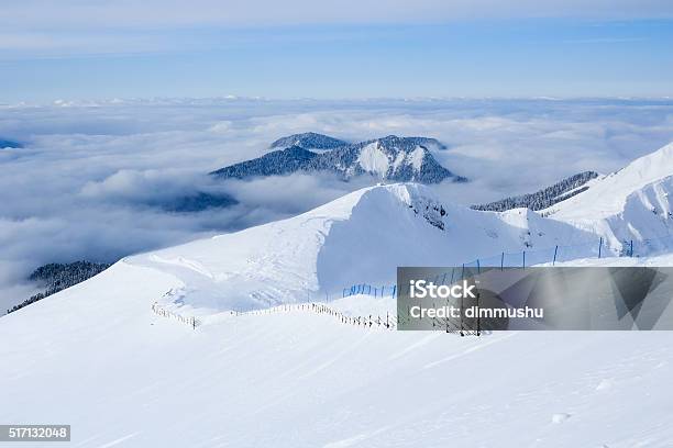 Wooden Fence Ski Trail In Caucasus Mountains Covered With Snow Stock Photo - Download Image Now