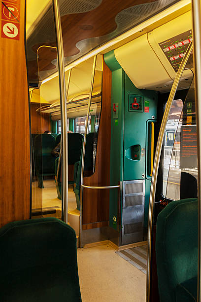istock Interior of train compartment with green benches. 517132510