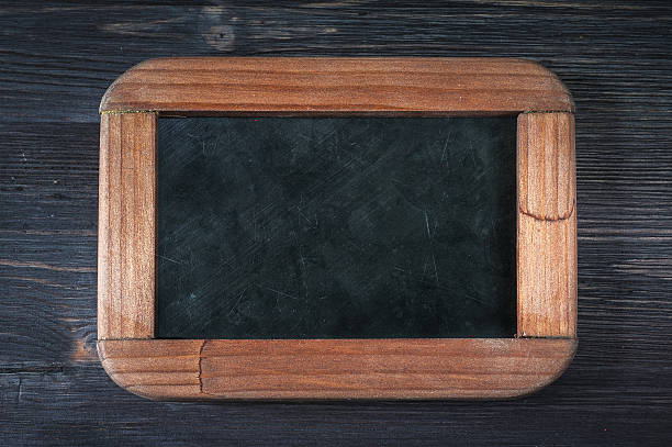 istock Chalk board on wooden background 517133145