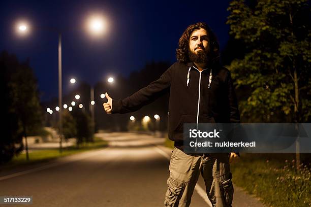 Hitchhiking At Night Stock Photo - Download Image Now - Activity, Adolescence, Adult