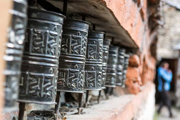istock Closeup of Tibetan praying wheels. 517133740