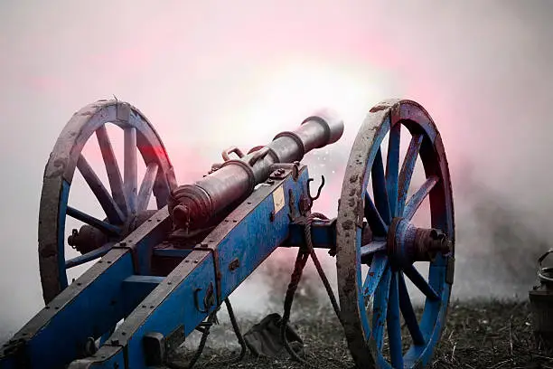 Firing, mounted, historic cannon in the smoke of the battlefield. Warfare of the 18th century. Nobody. XXXL (Canon Eos 1Ds Mark III)