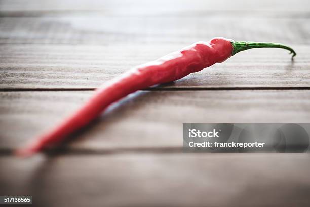 Mexican Red Hot Chili Peppers On Wood Plank Stock Photo - Download Image Now - Bell Pepper, Cayenne Pepper, Cayenne Powder