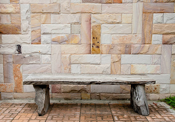 istock wood chair on brick wall background 517150217