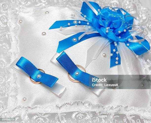 White Pillow For Wedding Rings With Blue Ribbons Stock Photo - Download Image Now - Backgrounds, Celebration, Close-up