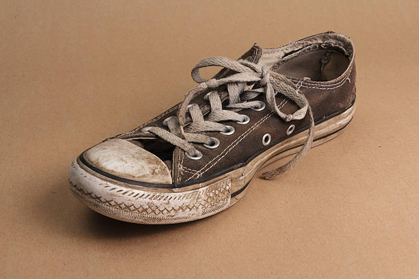 Shoe in really bad condition stock photo