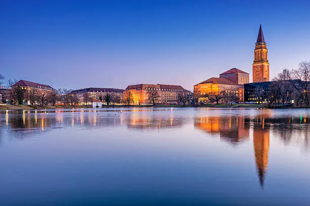 View over the Kleiner Kiel lake and Hiroshima park on the downtown and the landmark city hall of Kiel, the second largest city of Schleswig-Holstein, Germany.