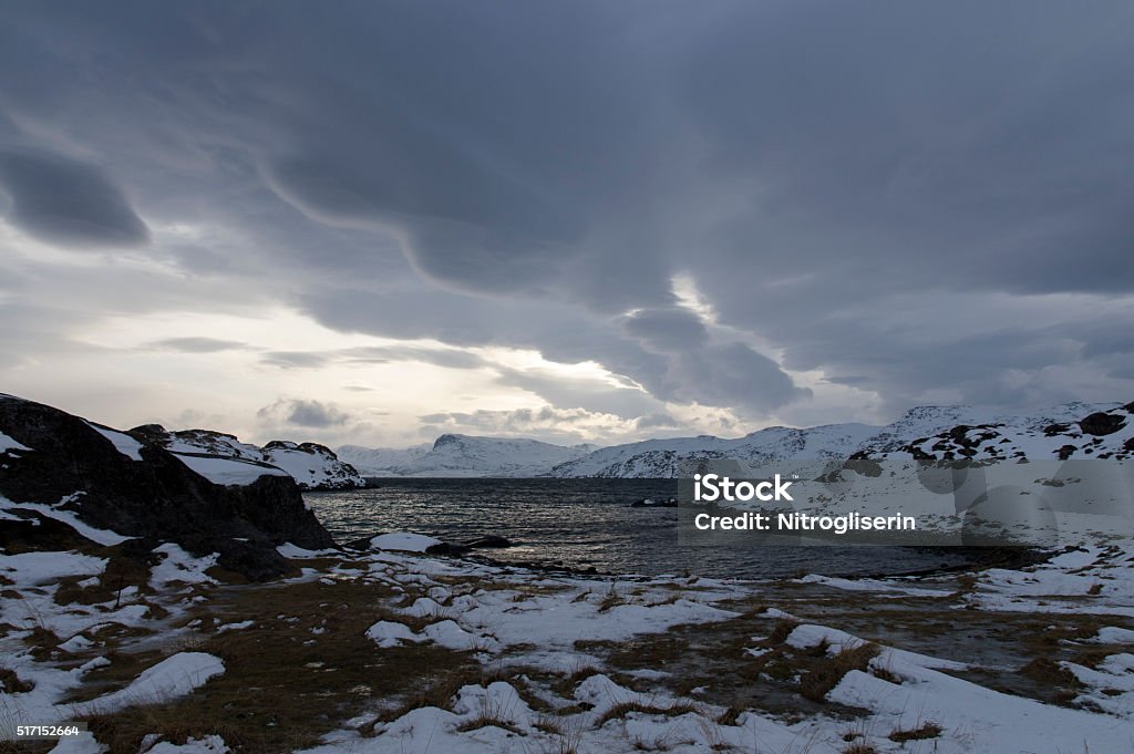 Fjords in Winter Cloudy fjord view in Hammerfest, Norway Cloud - Sky Stock Photo