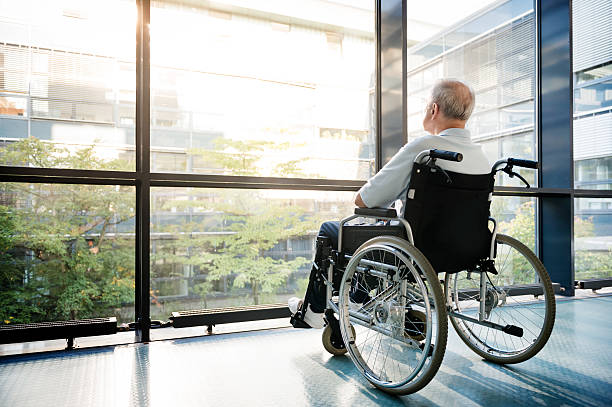 istock Senior Man in Wheelchair 517155511