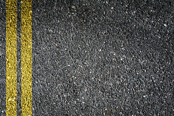 istock Double Yellow Sign on Asphalt 517156872