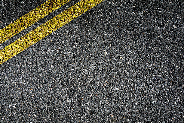 istock Double Yellow Sign on Asphalt 517157000
