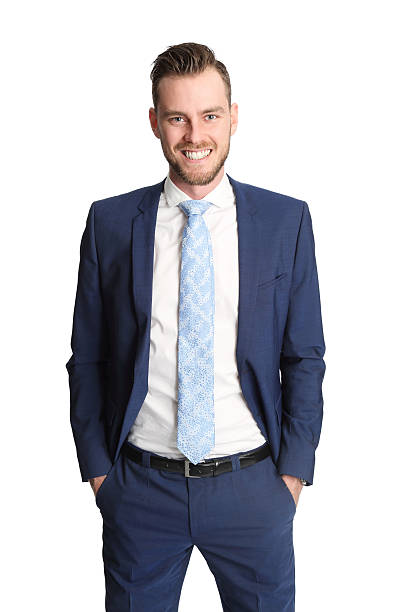 istock Attractive businessman in suit smiling 517157024