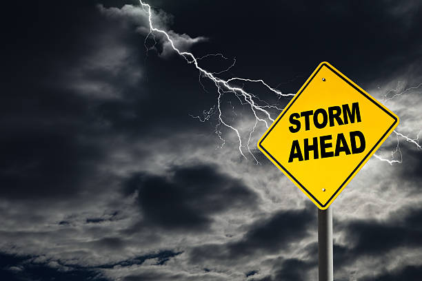 istock Storm Ahead Warning Sign in Thunderous Background 517157574