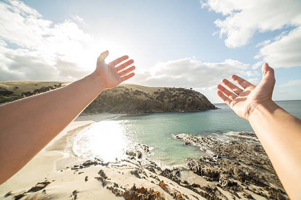 istock Woman's arms stretch towards a beautiful bay 517162698