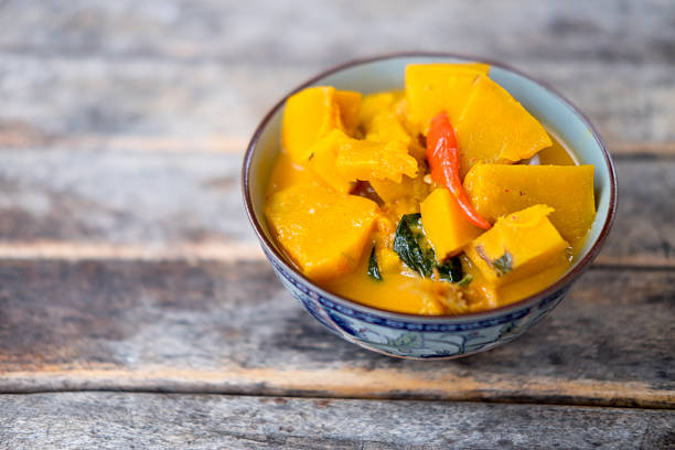 istock bowl of spicy pumpkin soup on table 517164990
