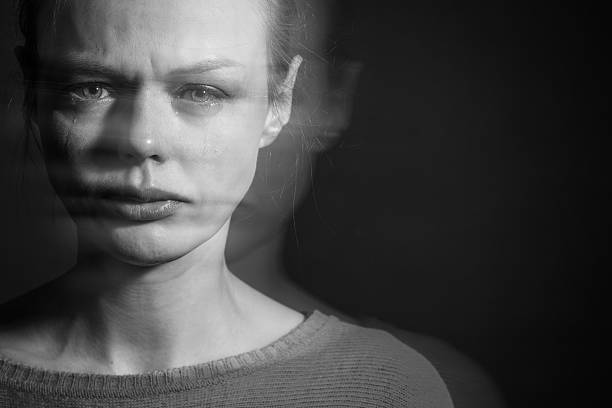istock Young woman suffering from a severe depression 517166234